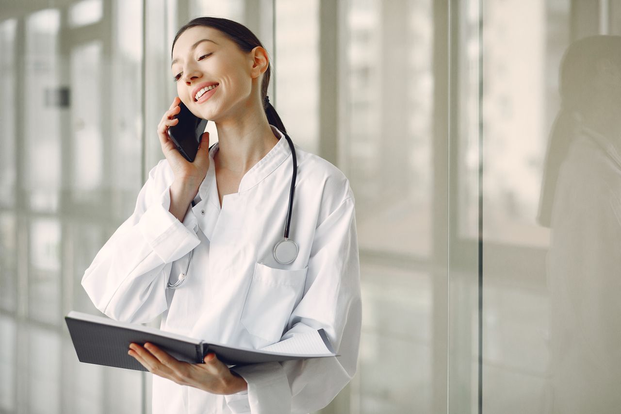 A doctor on the phone.