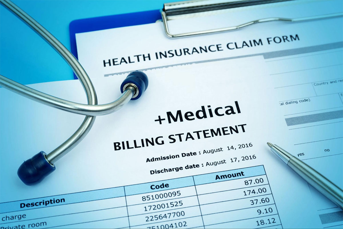 A medical bill and health insurance form.