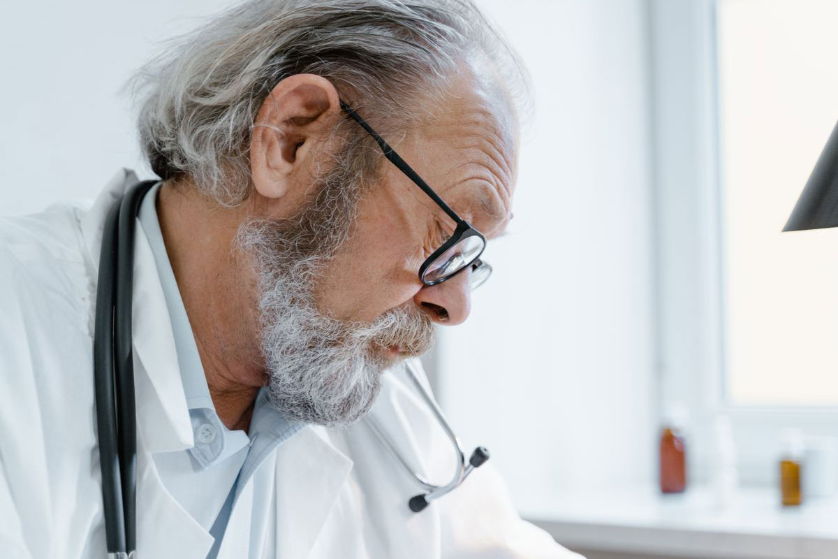 A doctor looking at billing errors.